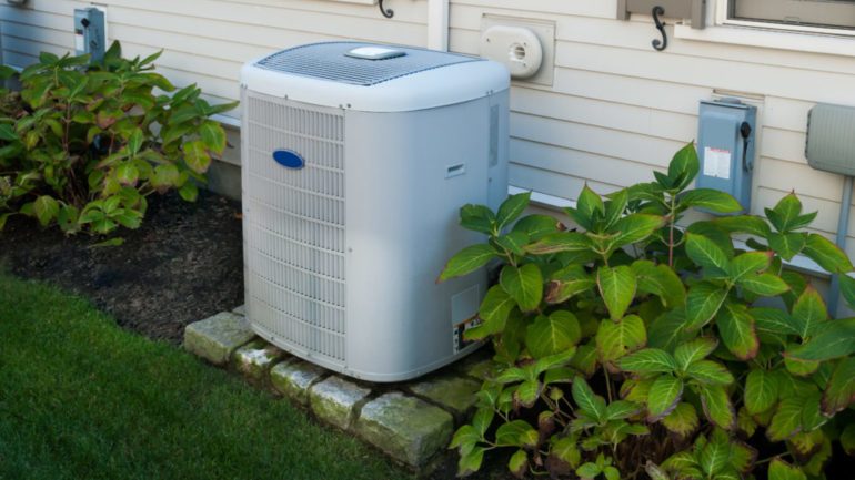 Photo of air conditioner unit that needs Summer maintenance.