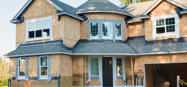 Luxury two story custom home under construction that buyers are waiting to move in.