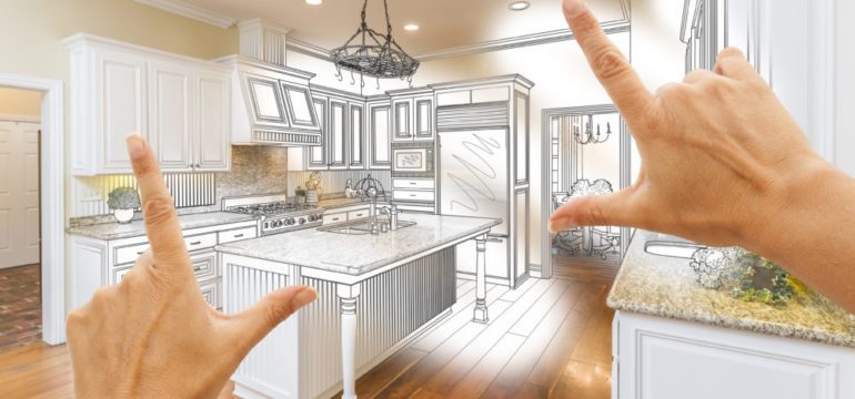 Female hands framing custom kitchen with luxury upgrades in a design drawing.