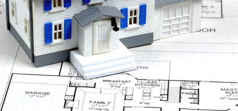 Miniature home and renovation blue print plans.