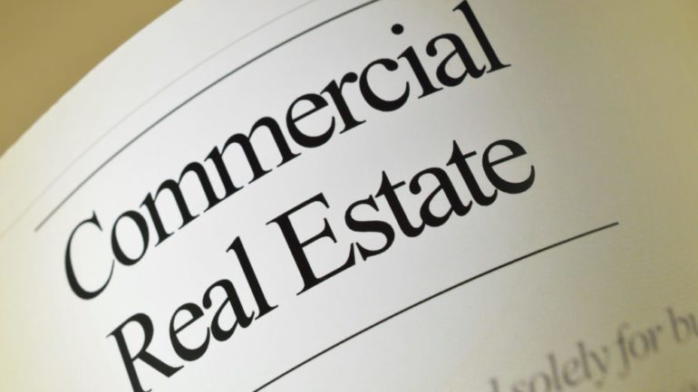 Black and white photo of commercial real estate transaction document.