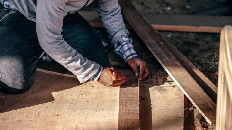 Service contractor working on a home repair and receive a tip from the homeowner.