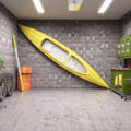 Interior of garage with sports gear organized against the walls.