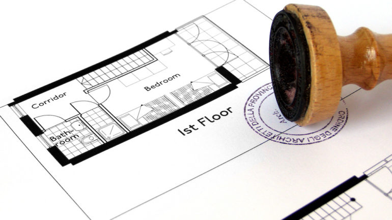 Home plans showing areas of unpermitted space that will need inspection.