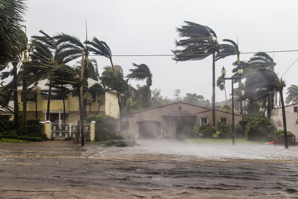 Photo of extreme weather damage flooding and wind do to hurricane.