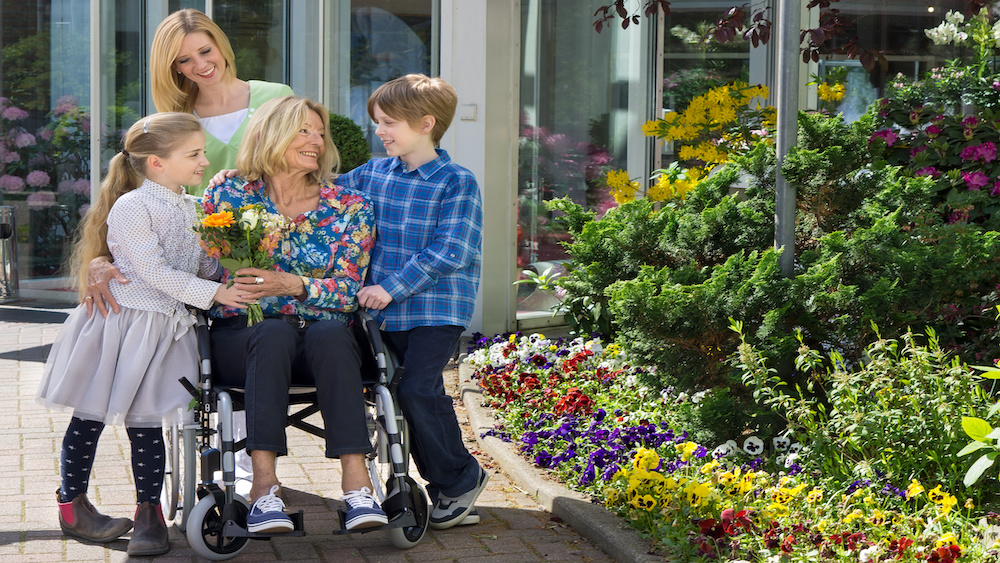 Precious family time together in backyard of grandmother's home with 'universal design'.