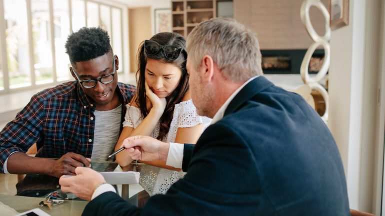 Real estate agent answering FAQs for first time home sellers.