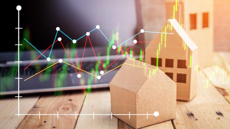 Real estate models on the top of wooden floor. Wooden house, building, and home. Flat design with graph with graph representing housing statistics for real estate industry.