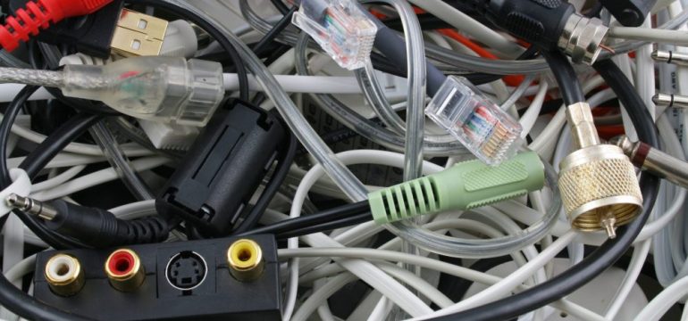 An assortment of cable TV and audio wires after cutting the cable cord on a television.