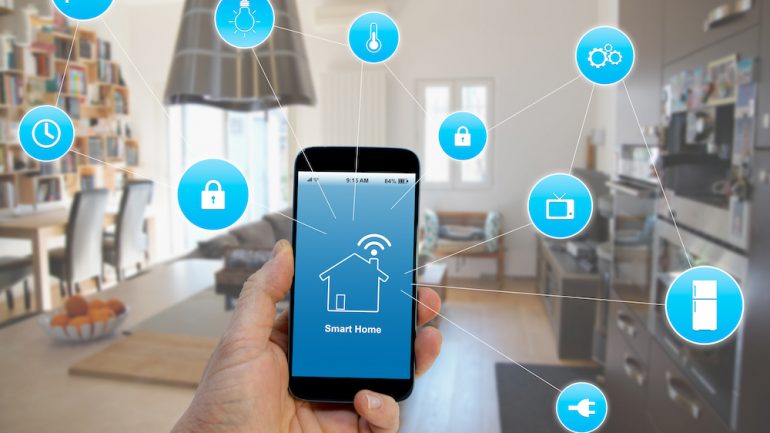 Smart home devices concept, smartphone with smart home applications on screen.