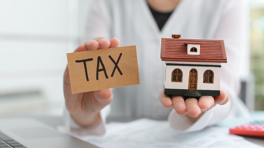 Can you buy a house if you have a tax lien 2025