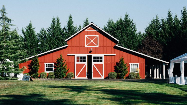 Large red barn converted to a living space.