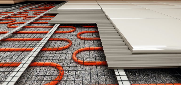 Radiant floor heating system structural detail in new home construction.