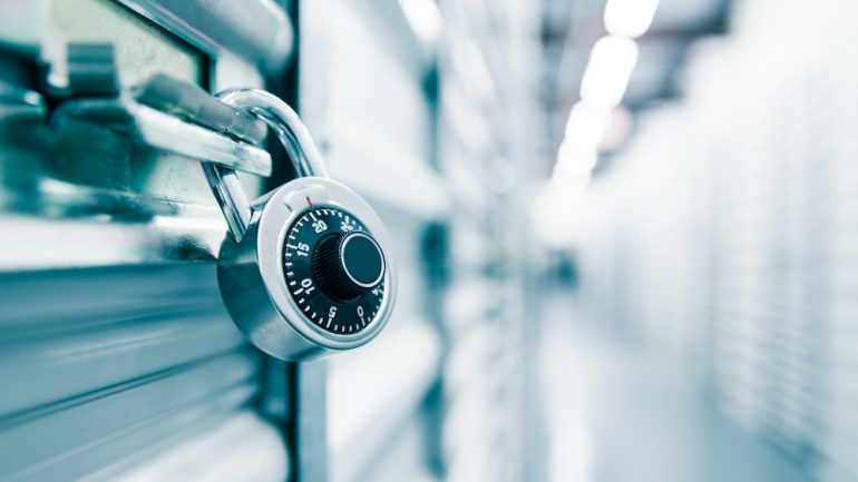 Combination lock on a self storage door. A storage solution when moving abroad.