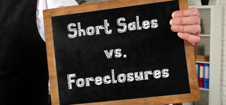 Blackboard reading, Short Sales vs. Foreclosures to describe concept of differences between distressed properties.