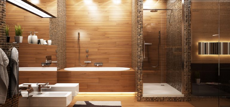 Bathroom lighting shown in various areas of a modern bath including shower, tub, sink and toilet area.