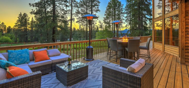 Beautiful deck during evening with new modern outdoor furniture.