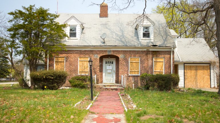 A rundown home that will be a problem for a neighbor if they list their home for sale.