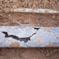 Broken sewer pipe that may be covered by peace of mind utility warranties
