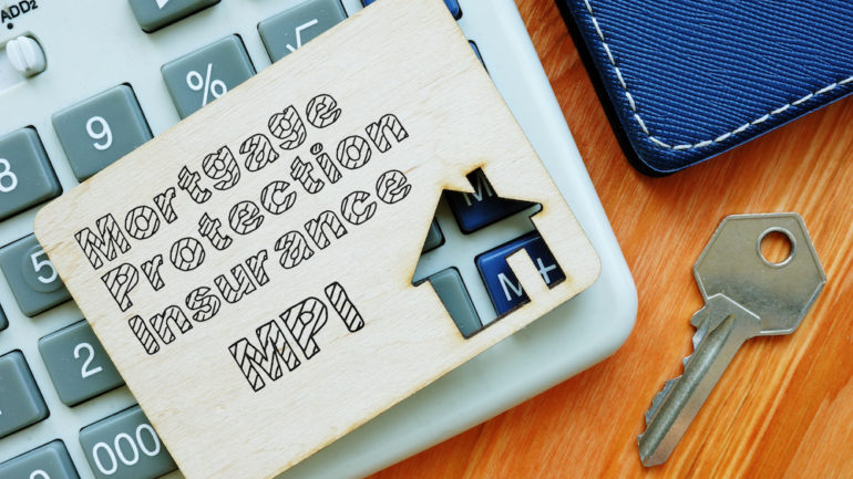 Business photo shows printed text Mortgage Protection Insurance on top of a keyboard.