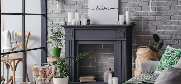 Interior of modern living room with decorative fireplace mantel.