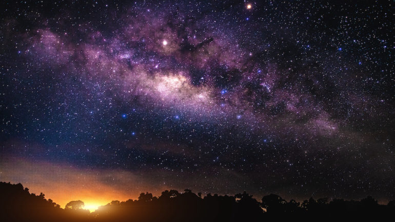 The beauty of the Milky Way galaxy and stars in the night sky before sunrise.