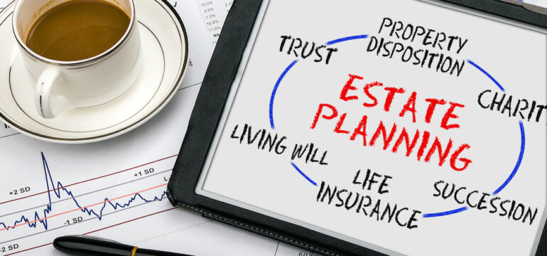 Estate planning concept on a tablet with terms including wills and trusts.
