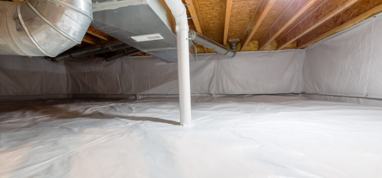 A home crawl space fully encapsulated with a vapor barrier.