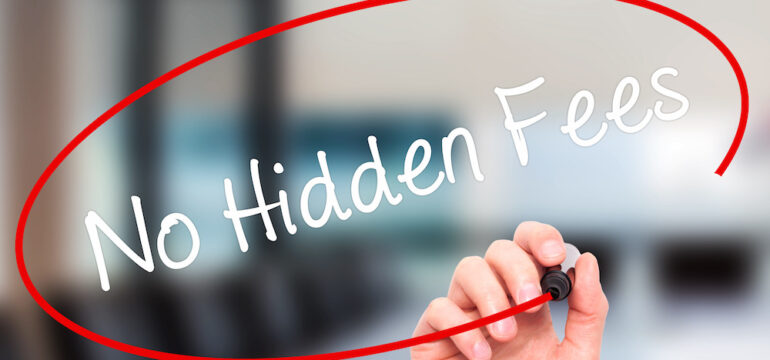 Man's hand writing "No Hidden Fees" with black marker on visual screen.