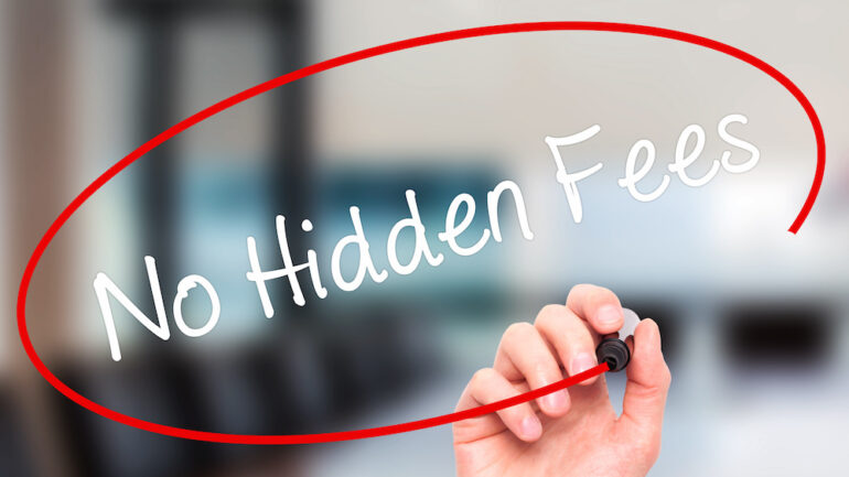 Man's hand writing "No Hidden Fees" with black marker on visual screen.