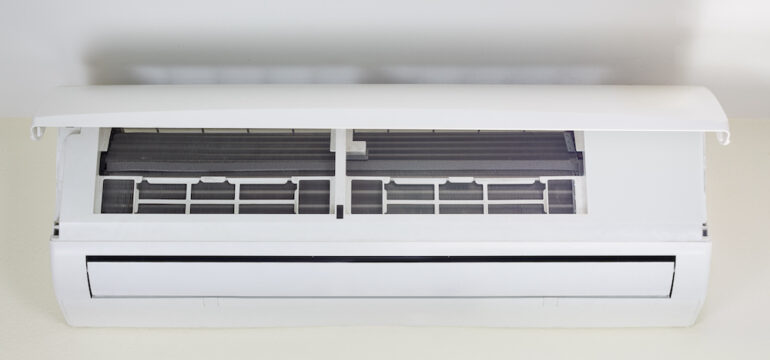 The cooling coil inside the ductless mini-split heating and air conditioner machine.