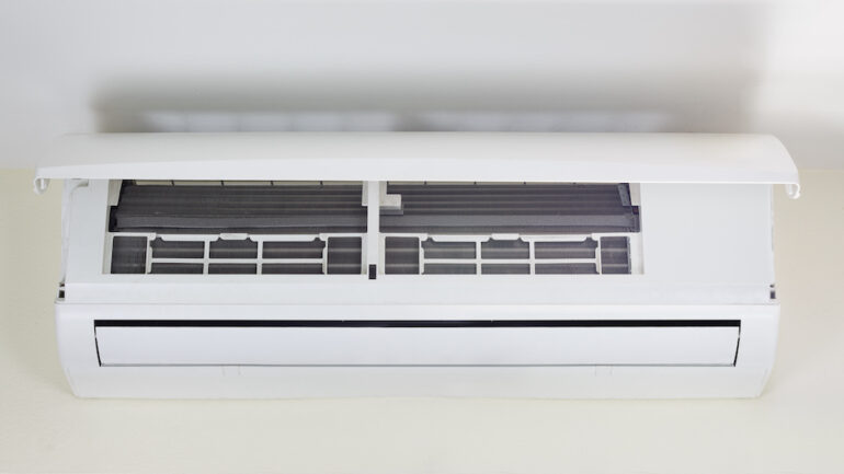 The cooling coil inside the ductless mini-split heating and air conditioner machine.