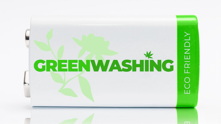 9-volt green and white battery with the word Greenwashing printed on it. Greenwashing is a communication technique aimed at building a false image of a company in terms of environmental impact.
