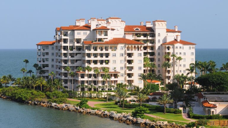 Modern waterfront building with time-share apartment units.