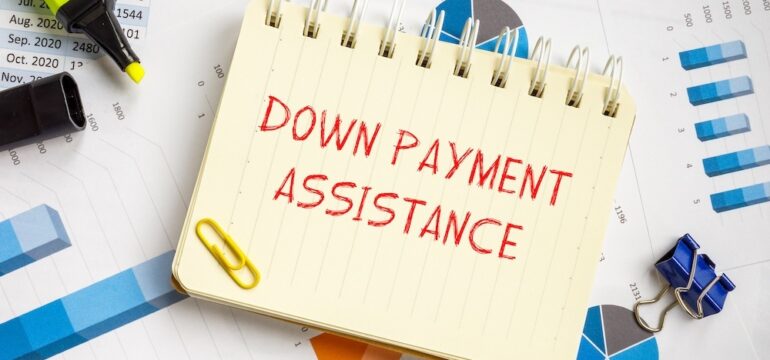Financial concept about Down Payment Assistance with phrase on the piece of paper.